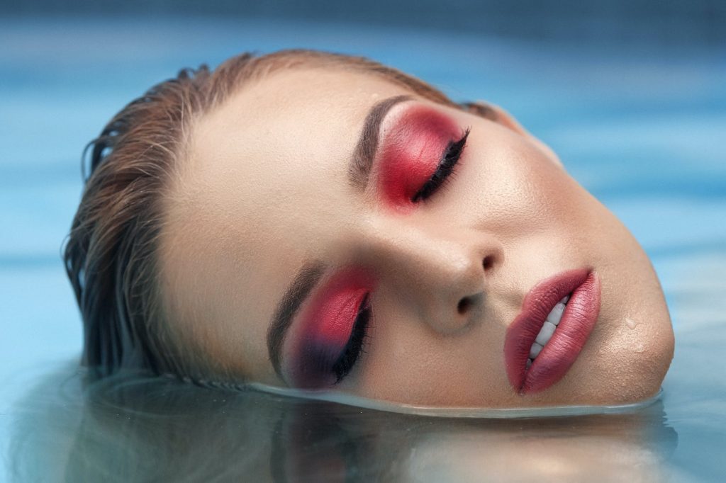 close up photo of woman on water