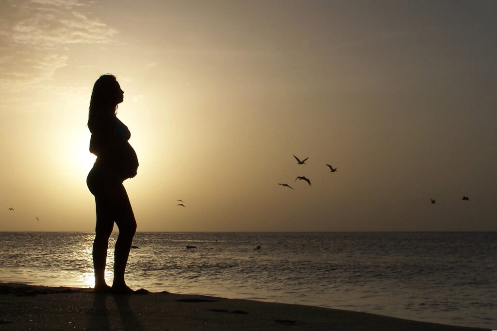 beautiful young, pregnant woman, in beach-1434863.jpg